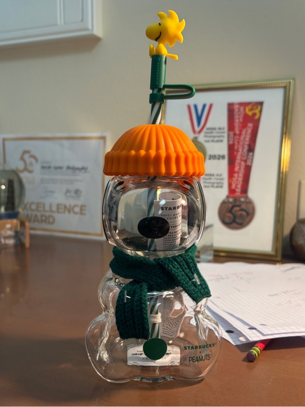 Starbucks Clear Snowman Bottle with Orange Hat and Green Scarf